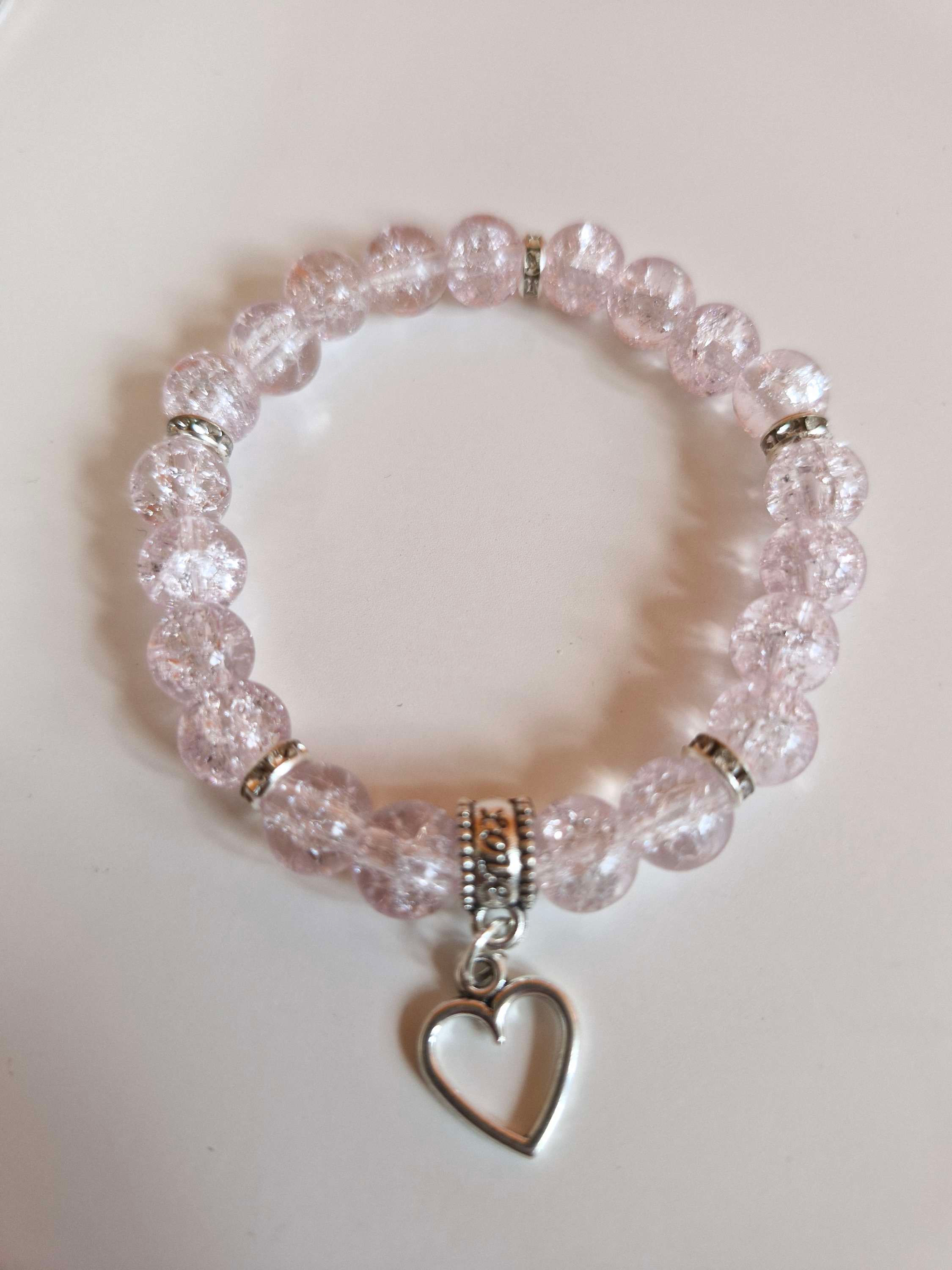 Pale pink glass bead bracelet with heart