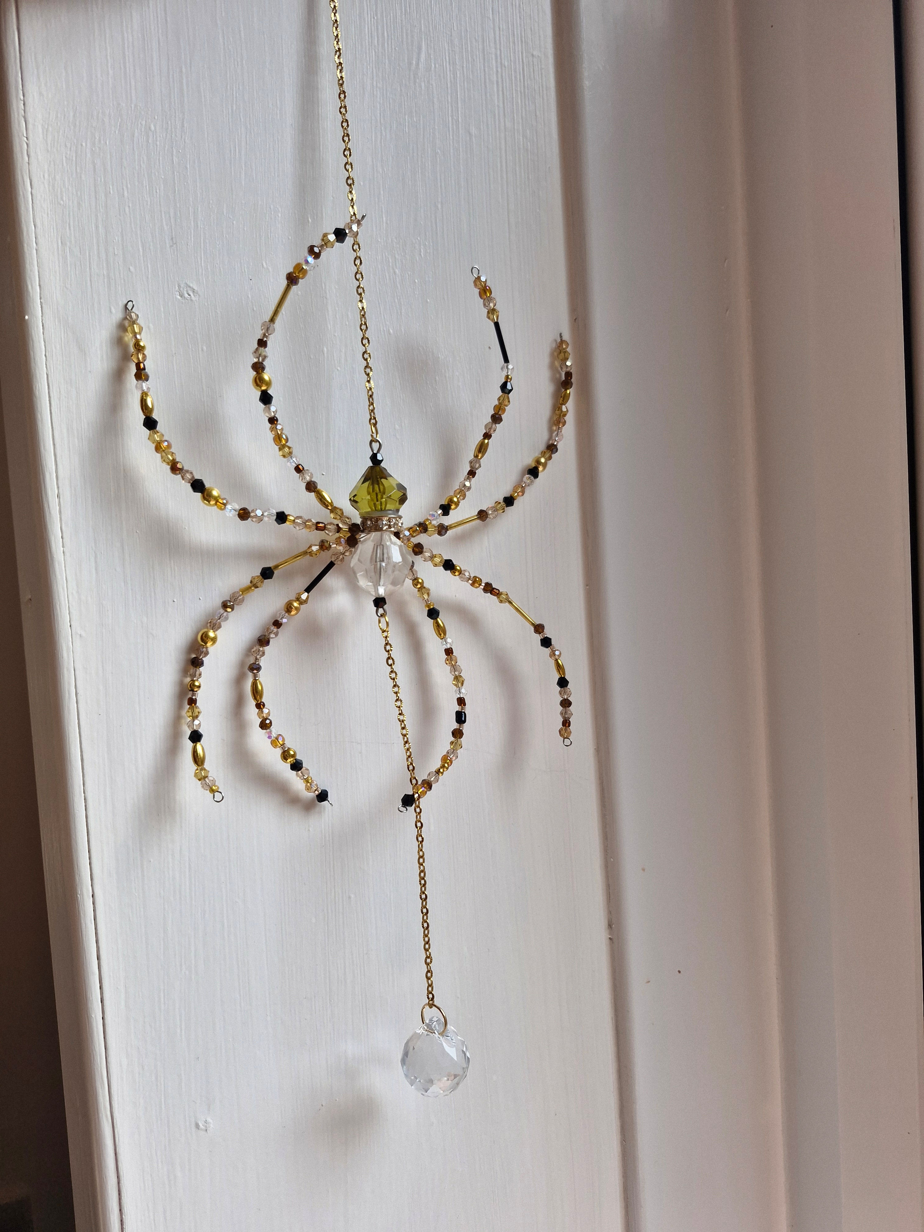 Golden spider suncatcher