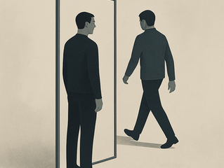 Man in black stands before a mirror showing his reflection walking away. Minimalist setting, neutral tones, and contemplative mood.