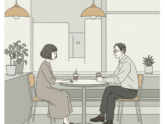A man and woman sit in a minimalist cafe, talking over drinks. Neutral tones, potted plants, and pendant lights create a calm mood.