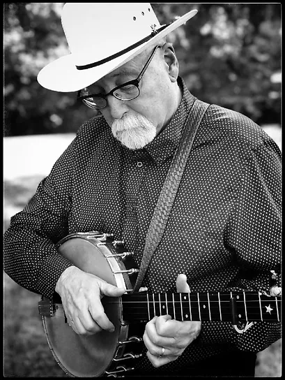 Joe with hat and banjo.webp