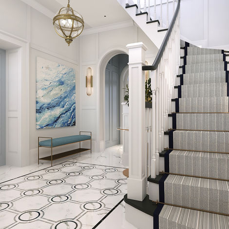 Stunning entrance hallway with marble effect tiles. Grand staircase and chandelier. Luxury home refurbishment