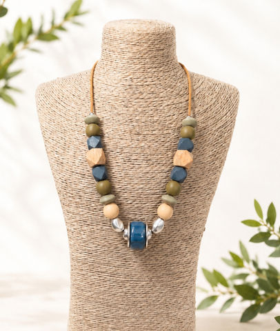 Neautral tone necklace with wood, ceramic and silicone beads and sliding length adjuster