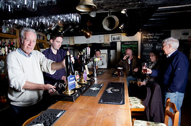 Founder Richard Bishop behind the bar