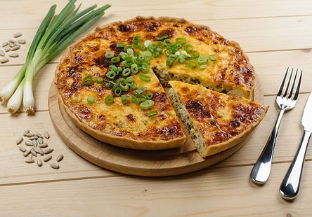 Cheese and green onion quiche with sunflower seeds