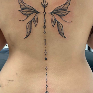 spine tattoo, wings, butterfly wings, fairy wings, back tattoo