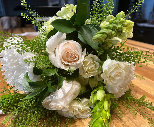 Flowers for a funeral with the best florist in CDA Wallflower Florist