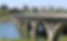 1200px-University_Bridge_and_South_Saskatchewan_River,_Saskatoon_-_panoramio_(1).jpg