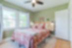 This second floor bedroom offers a spacious place to rest and relax. This suite offers ample space for all of your Notre Dame fan gear.