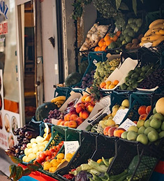 Shelves of vegetables outside a shop