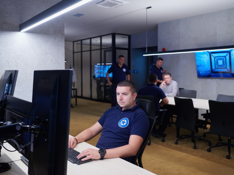 man at computer desk in office