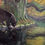 Thumbnail: A black bear wanders in front of a pond under a Texas live oak tree.
