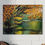 Thumbnail: A black bear wanders in front of a pond under a Texas live oak tree.
