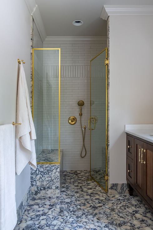Luxurious shower with calacatta viola designed by Kyle Build Homes & Interiors 