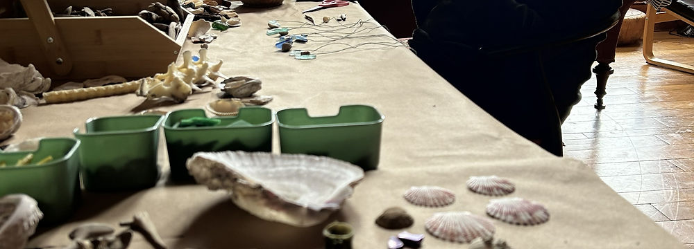 Workshop table set with dried flowers and craft materials