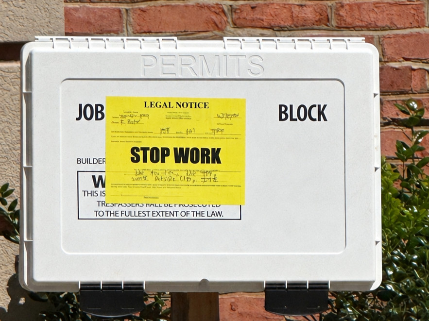 Stop-work notice posted at an Atlanta residential property