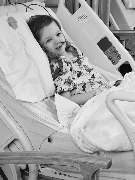 Girl post op smiling.