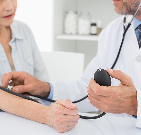 Doctor measuring blood pressure