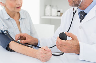Doctor Measuring Pressure