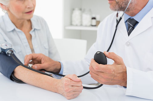 Doctor Measuring Pressure
