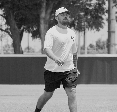 Baseball Coaches mentoring young athletes