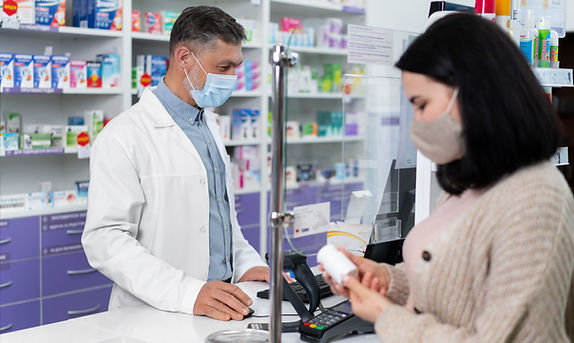 medium-shot-pharmacist-helping-patient (1).jpg