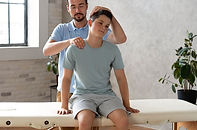 man-helping-patient-physiotherapy-full-shot.jpg