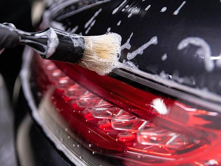 stock-photo-car-detailing-studio-worker-cleaning.jpeg