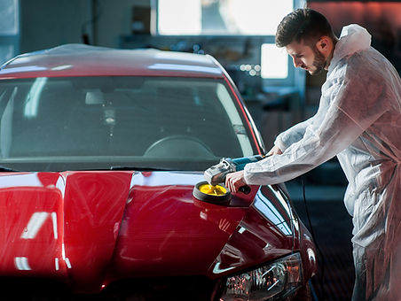 man-waxing-a-car-professional-car-detailing-experts.jpeg