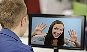 Man and woman having video call
