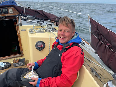 Pete having breakfast on board
