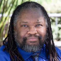 Yosenio Lewis, an American trans man of colour, being interviewed