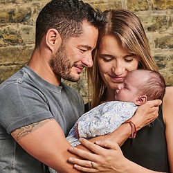 Jake Graf, a White British trans man, standing with Hannah Graf, a White British trans woman, in the documentary Our Baby