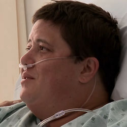 Chaz Bono, a White American trans man in the documentary Becoming Chaz