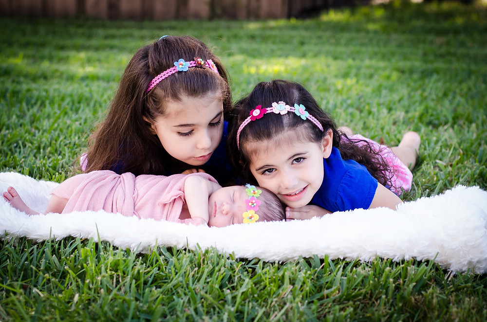 Olivia and Eleanor in their backyard Sarasota home.