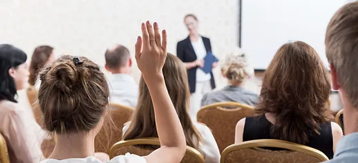 Food Safety Class student raising hand for question.