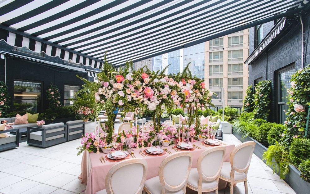  A rooftop wedding reception at a French bridal shower, showcasing the elegance of the event.