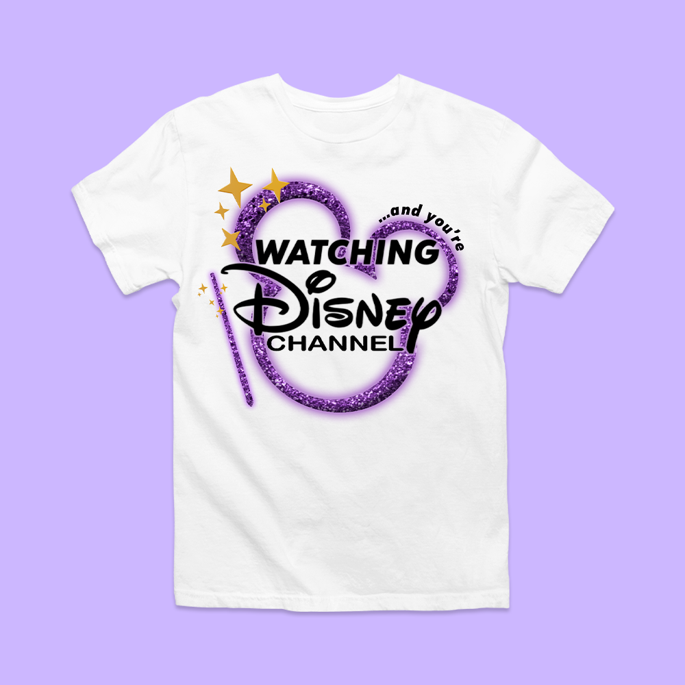 White t-shirt with Disney Channel logo, You're Watching Disney Channel Shirt on purple background.