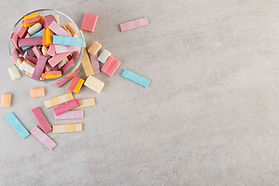 glass-bowl-colorful-chewing-gums-stone-table.jpg
