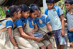 Girls Using Donated laptop