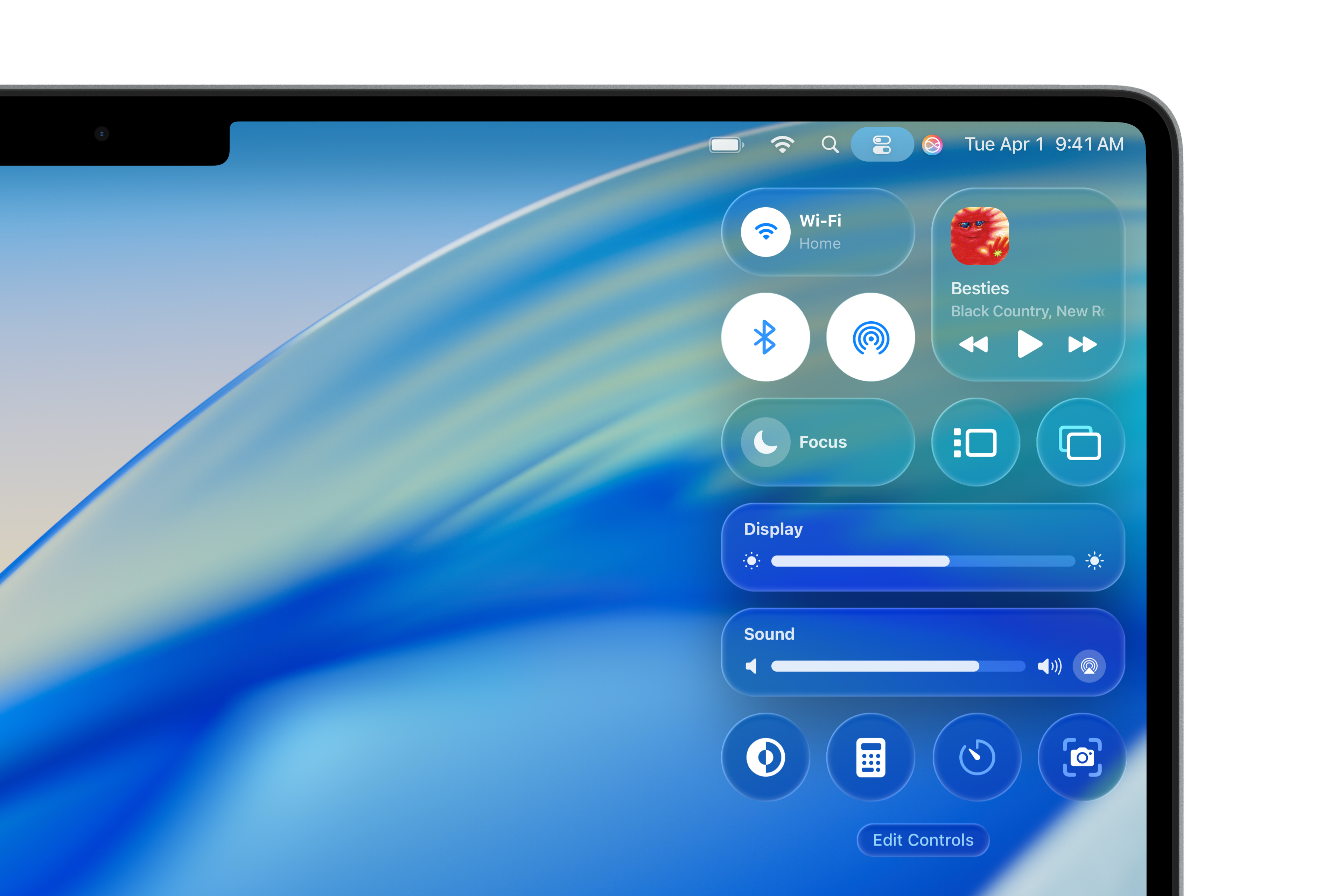 Un MacBook Pro 16 pouces affiche le Centre de contrôle et met en valeur le nouveau design de macOS Tahoe.