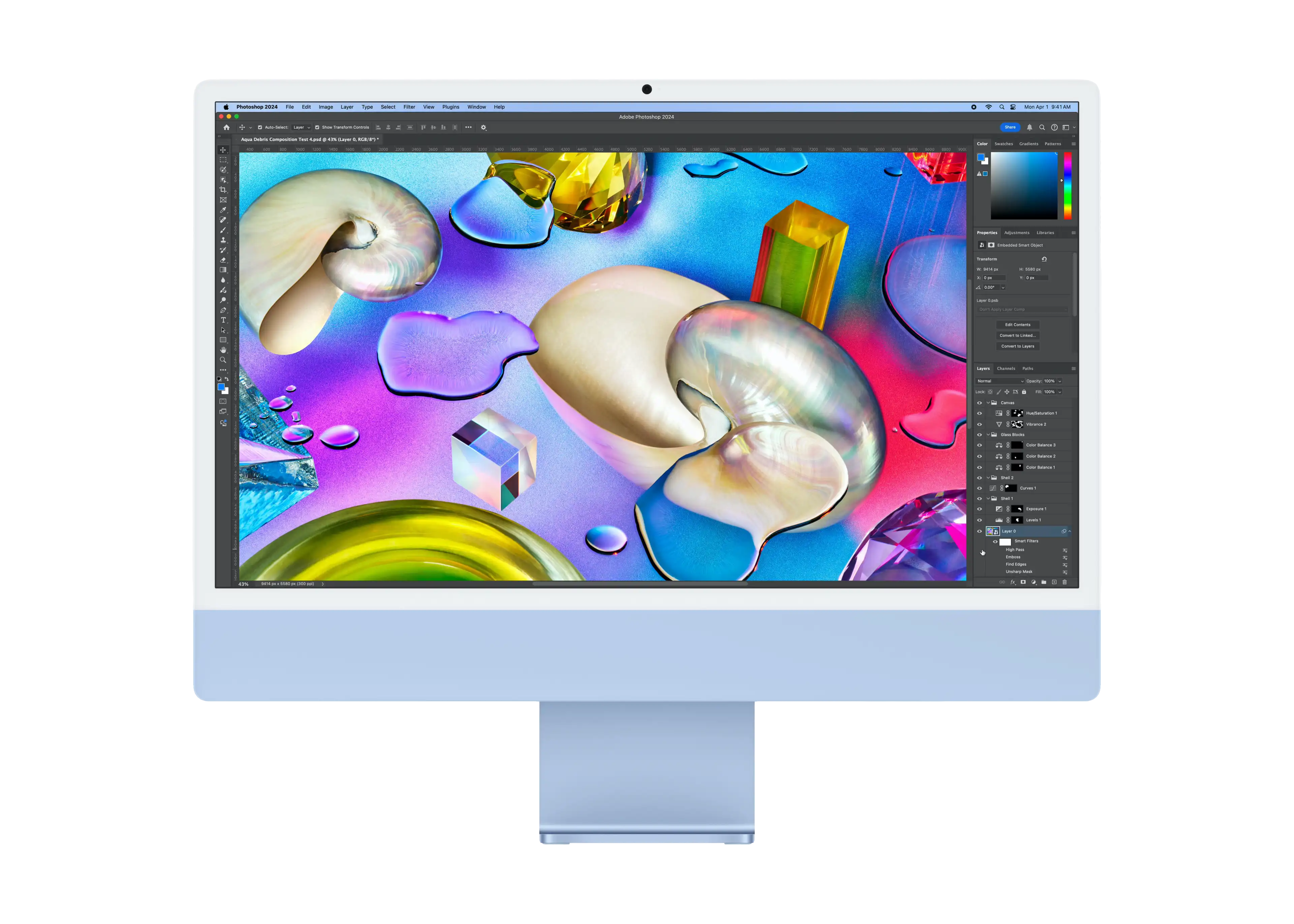 Une personne utilise Photoshop sur un iMac bleu.