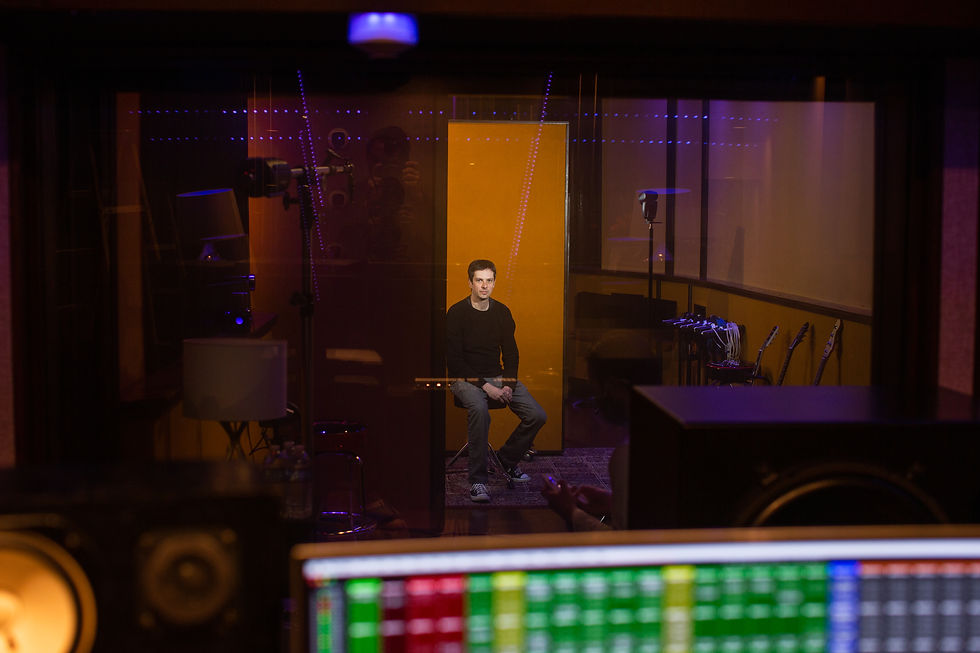 Close-up view of a handheld microphone on a stand