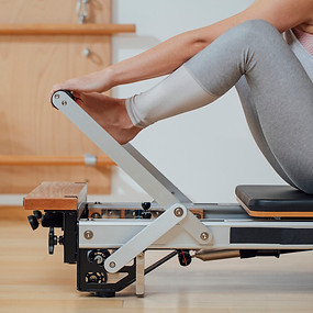 Woman on Pilates Reformer