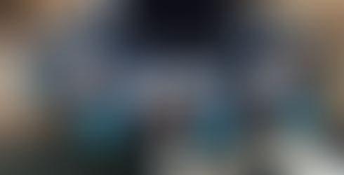 Ark Health display table with EthOss Bone Regeneration mugs and socks on top