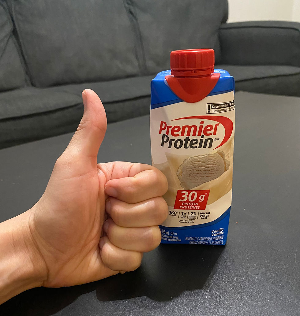 A thumbs up next to a protein shake