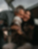 A couple with their dog celebrating after buying an investment property