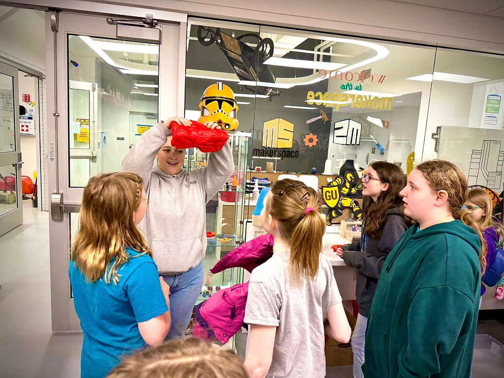 Girl Scout Troop #46822 exploring MakerSpace 3D prints