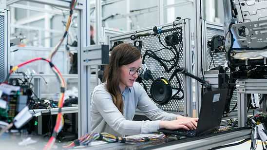 Female%25252520electronics%25252520engineer%25252520runs%25252520vehicle%25252520tests_edi