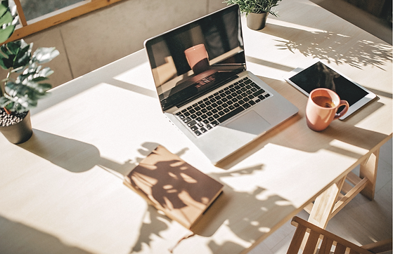 Welcome image with laptop on desk